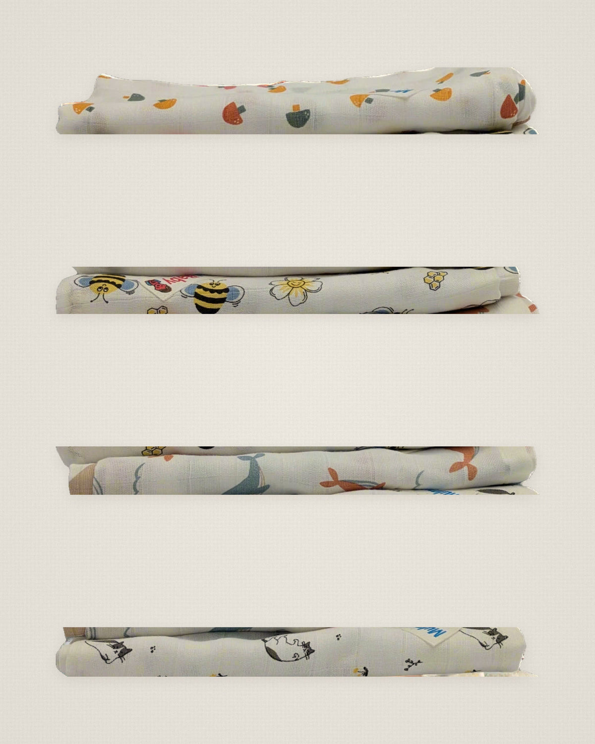 The four mulmul muslin baby towel prints shown as separate fabric strips side by side.