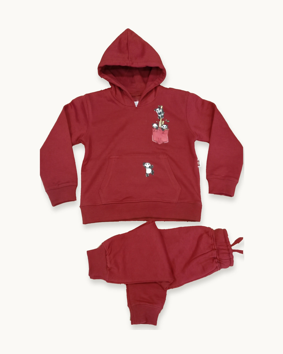 Red hoodie with the matching joggers folded below it