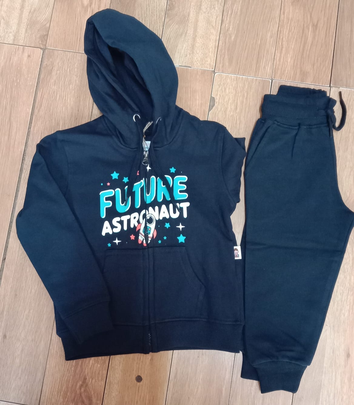 Navy Future Astronaut zip hoodie with matching joggers, laid flat