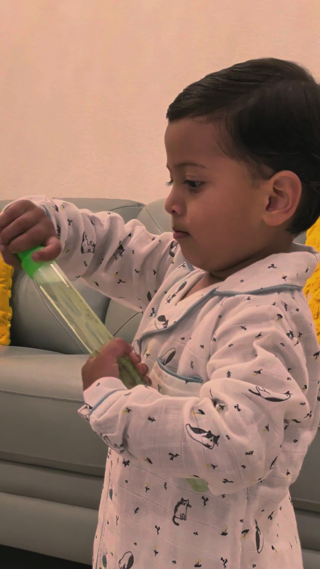 Real toddler in the 2-piece organic muslin night suit, cozy at home